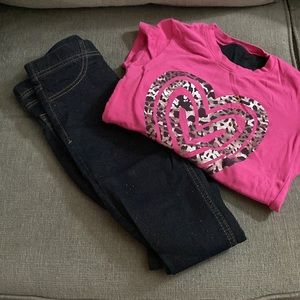 Pink heart shirt w/ cut out back and size 8 dark/glitter jeggings.